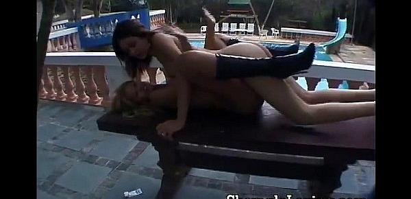  Two hot shemales fucking on the balcony